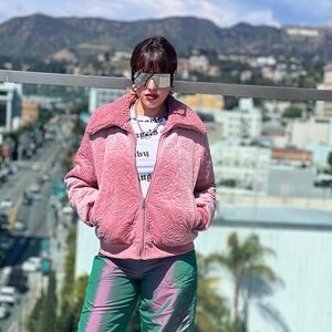 Pink jacket with flowers pattern